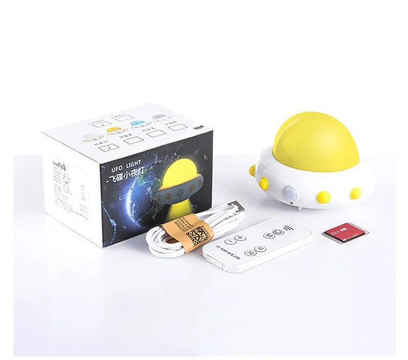 Remote control UFO shaped bedside night light in blue, pink, or white colour options.