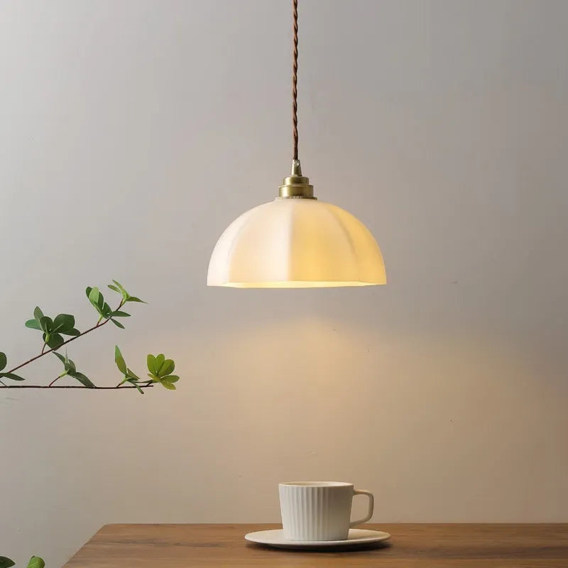 Brass Chinese style droplight with copper glass shade for bedside or dining room