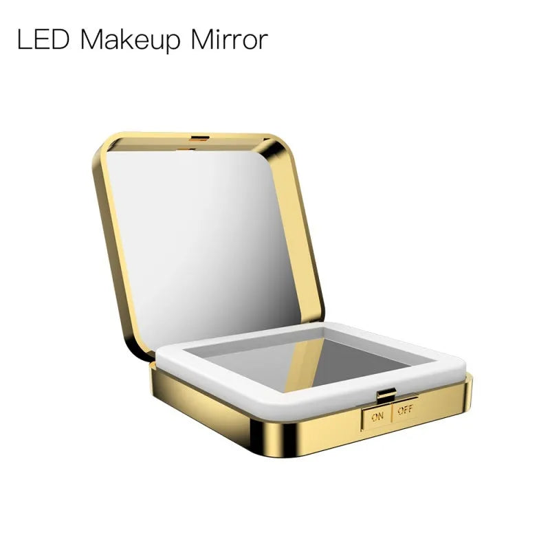 Black and white makeup mirror with dual magnification surfaces and adjustable lighting controls