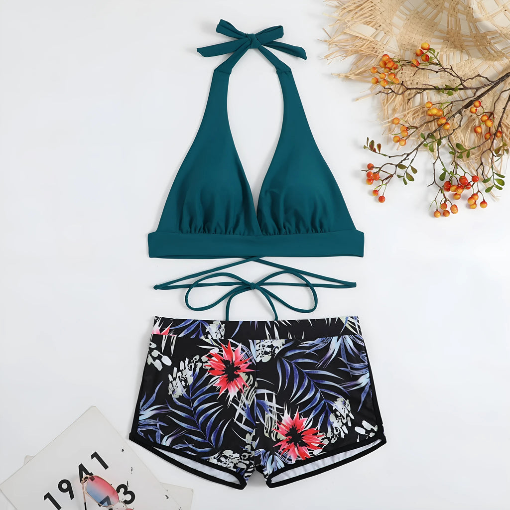 High waist split bikini in nylon with polyester lining, shown in peacock green, red, or black, sizes S to XL