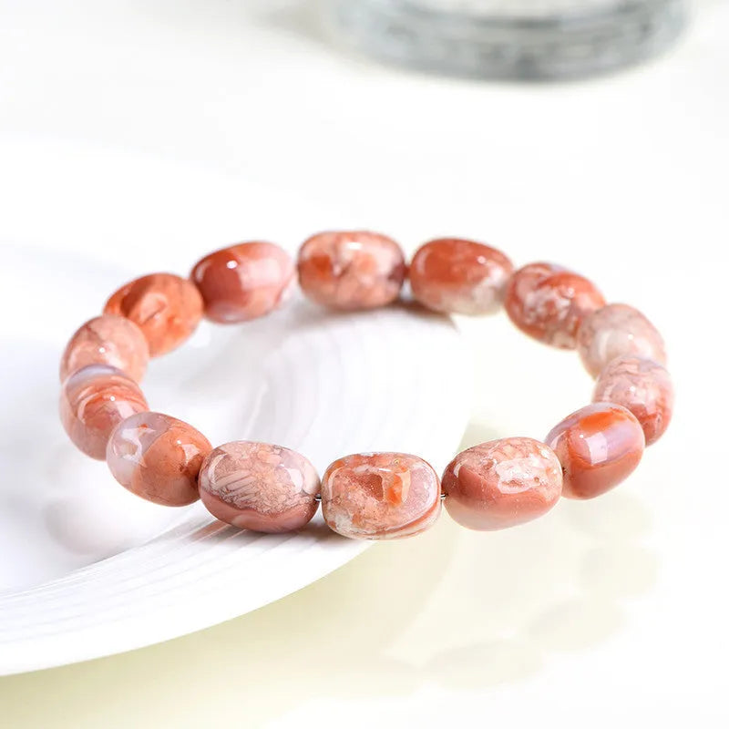 Natural cherry agate barrel bead bracelet with geometric design and ruyi elements