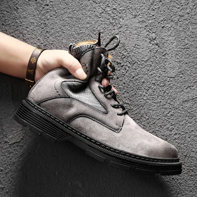 Men's vintage style Martin boots in black, sand, and grey colours with a low thick heel and round toe.