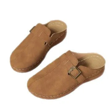 Women's lightweight wedge slippers in various colours with cloth upper and rubber sole.