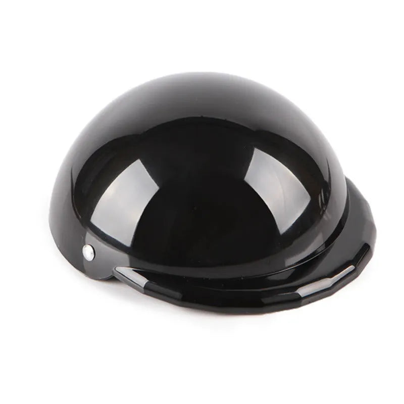 A pink plastic dog helmet cap showing its rigid shape and solid colour, sized for a small dog.