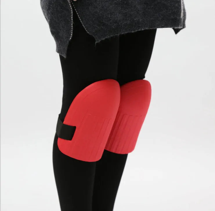 A pair of black and army green EVA foam knee pads for gardening protection.