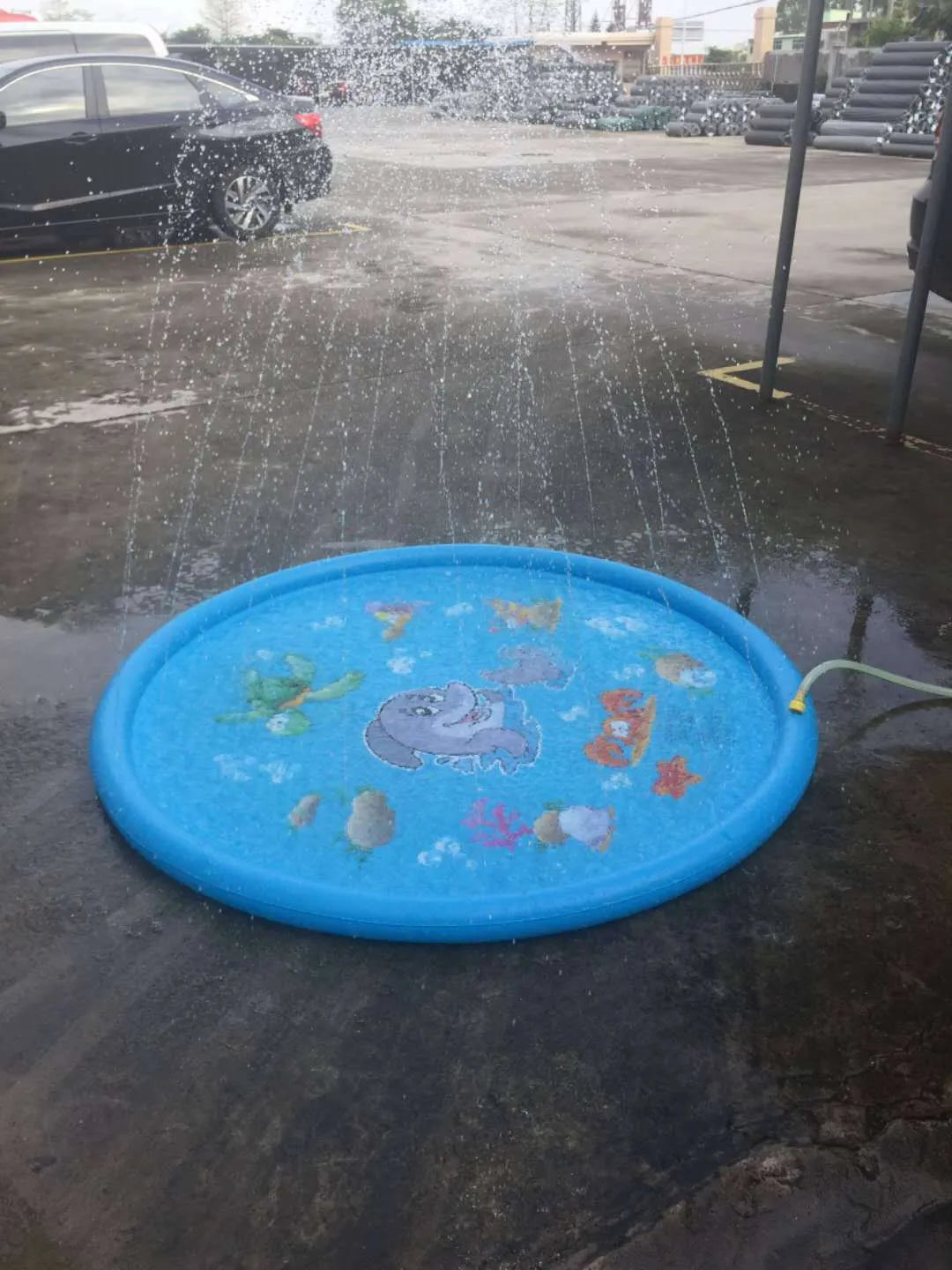 Blue PVC children's water spray mat with marine animals design for outdoor play