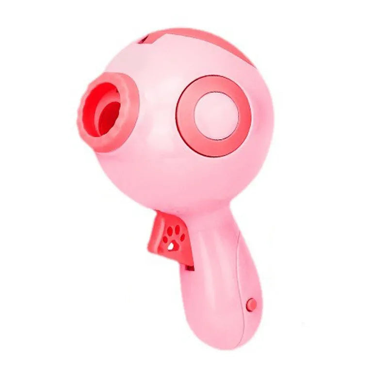 Green, orange, and pink interactive dog treat launcher toy for training and play.