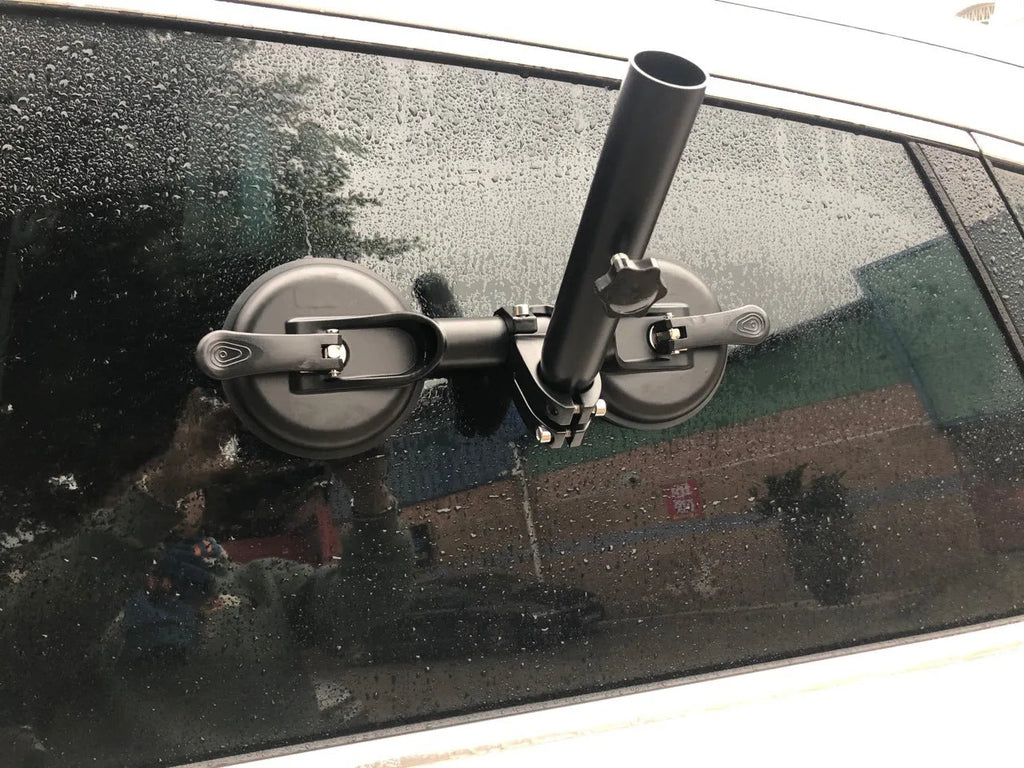 Black off-road car glass sucker mount with round rubber suction cup on ABS plastic base