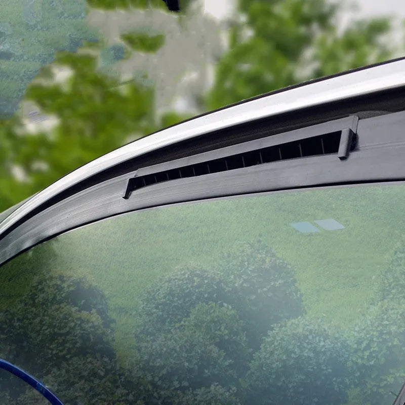 Portable black and white car ventilation fan with USB power cord for reducing exhaust odour