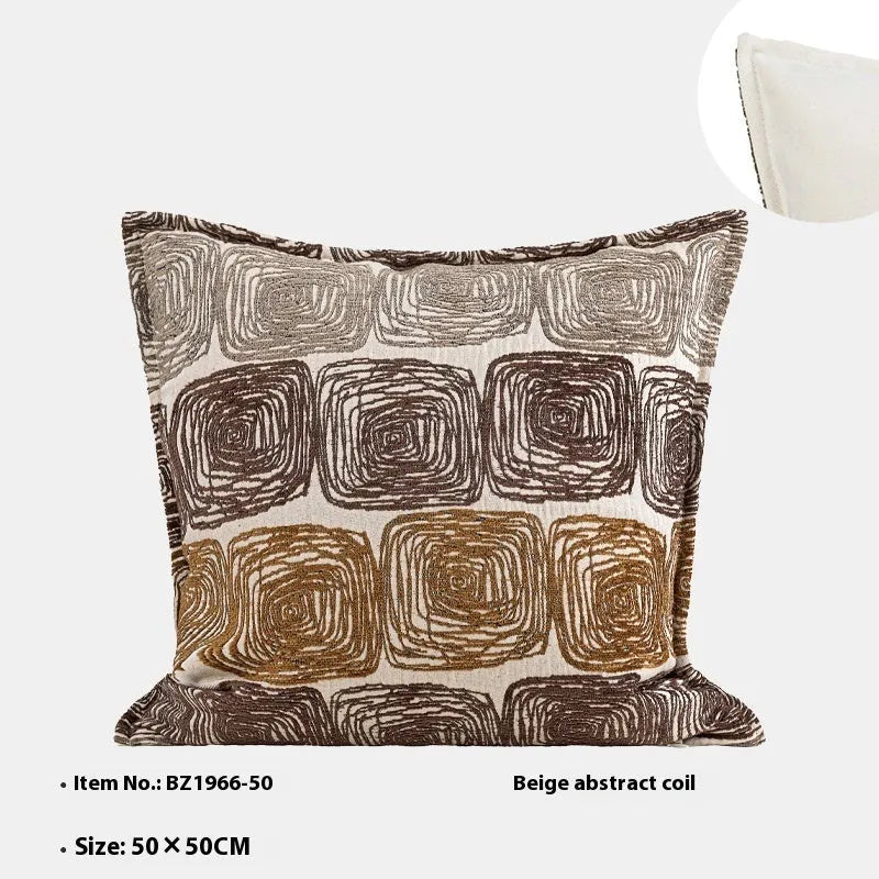 Cream and coffee abstract coil pattern square pillow cover made from polyester feather velvet.