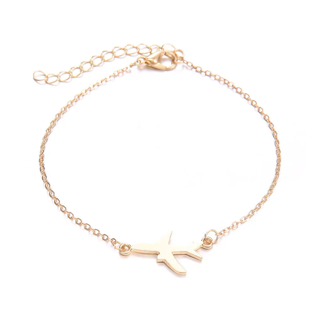 Three women's bracelets with heart-shaped aircraft map charms in bohemian style