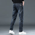 Men's slim straight casual trousers in polyester fabric with micro-elastic waist and zipper fly