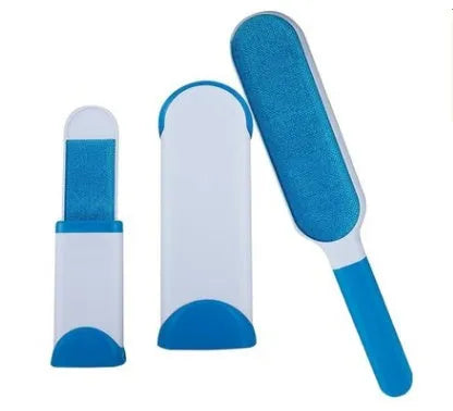 Blue reusable pet hair removal brush with double-sided sticky head placed on its self-cleaning base.