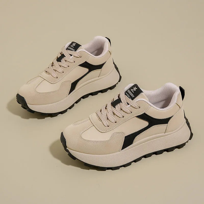 Women's casual platform sport shoes in solid colours with flat rubber sole and lace-up front.