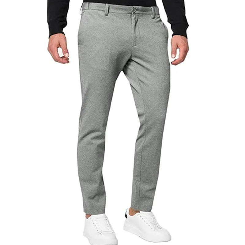 Men's slim-fit chino trousers in tapered style with pleated front, shown in khaki colour