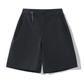 Men's solid colour quick-drying sports shorts with elastic waist, shown in army green.
