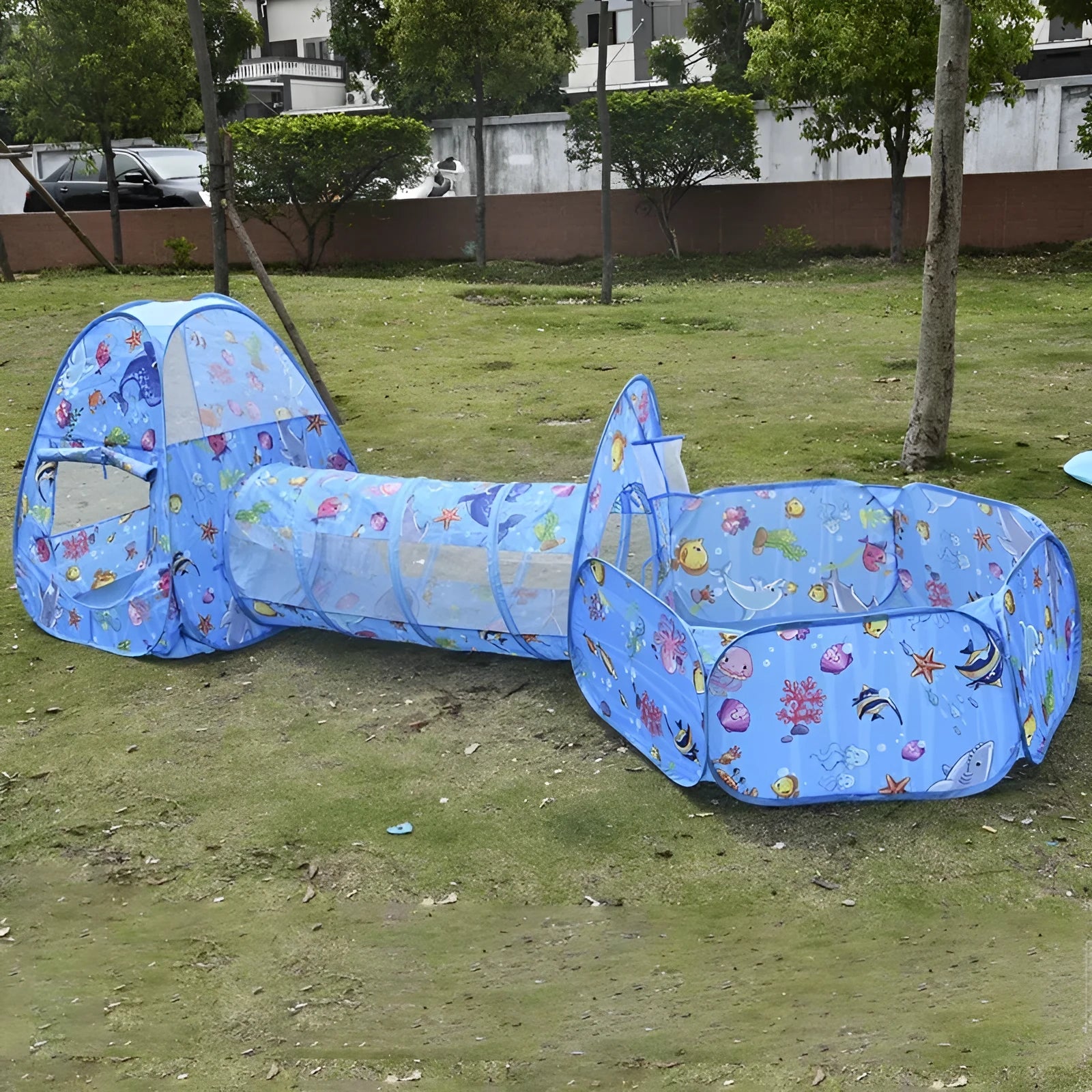 Three-in-one children's tent with marine cartoon design showing fabric tent, ball pool and connecting tunnel sections