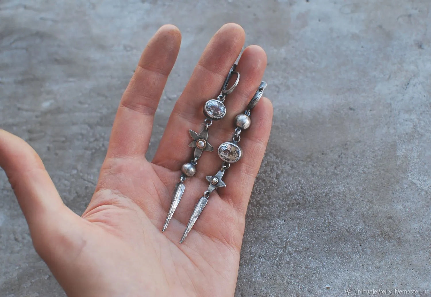 Geometric pendant earrings with antique silver plating and rhinestone detailing