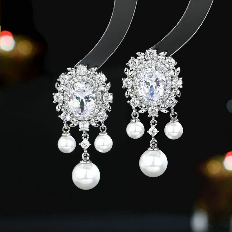 Oval geometric pearl tassel earrings with zircon inlaid stones in light purple colour