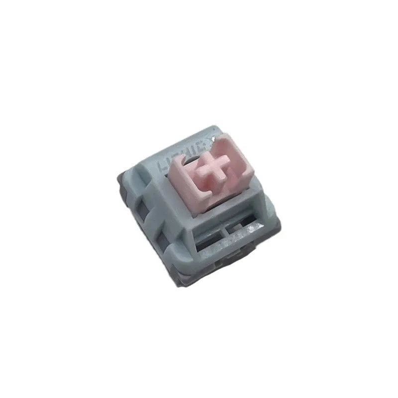 Four Dew Axis-4 coloured mechanical keyboard switches showing three-colour composite shaft core and bridge plug-in structure