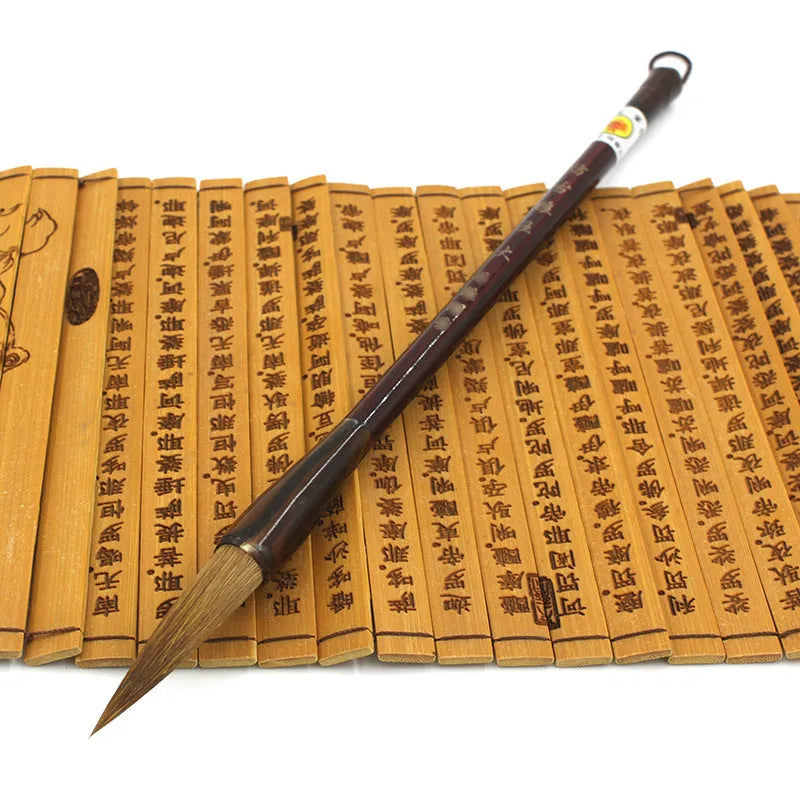 Traditional Chinese wolf hair calligraphy brush with steel rod, styles include large, medium, and trumpet.