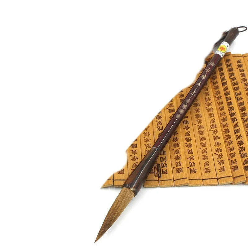 Traditional Chinese wolf hair calligraphy brush with steel rod, styles include large, medium, and trumpet.