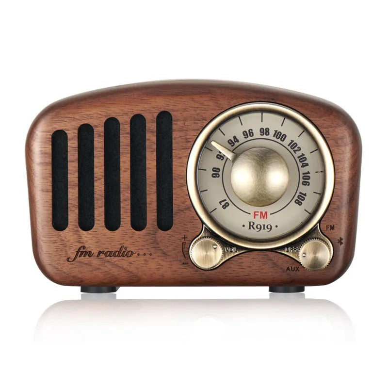 Retro wooden wireless mini Bluetooth speaker in cherry wood or walnut finish measuring 111.6mm x 50mm x 68mm