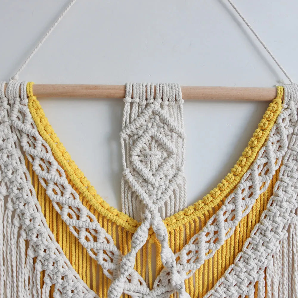 Nordic style hand-woven cotton tapestry in creamy-white with yellow detailing