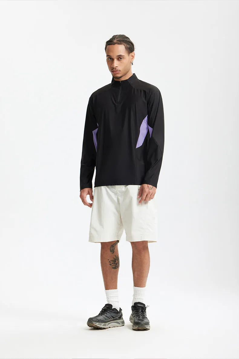 Men's lightweight solid colour polyester top with stitching detail, shown in black and beige with long and short sleeve options.