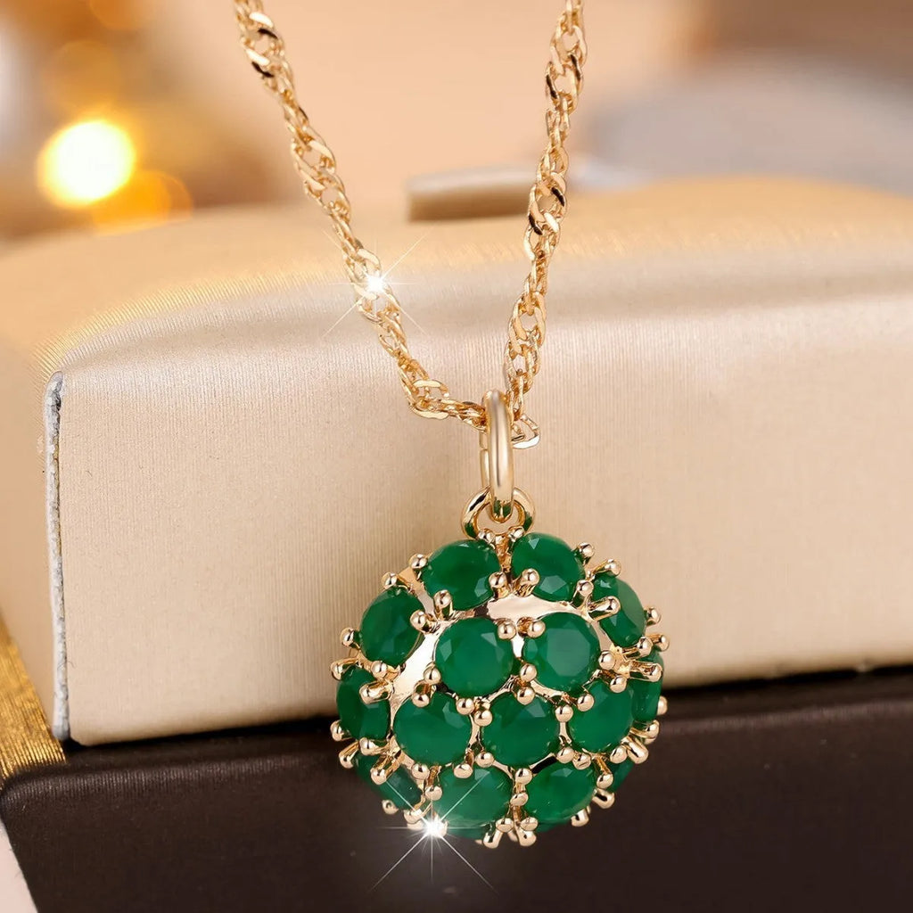Round geometric emerald diamond necklace with champagne gold finish and adjustable chain
