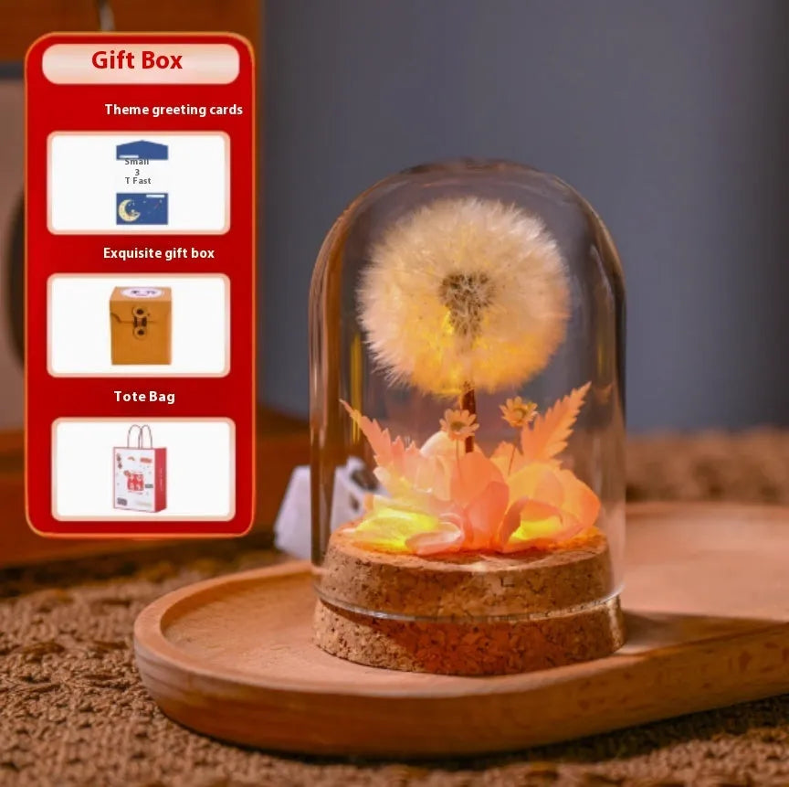 Glass dandelion-shaped night light ornament with gradient colour options on display surface
