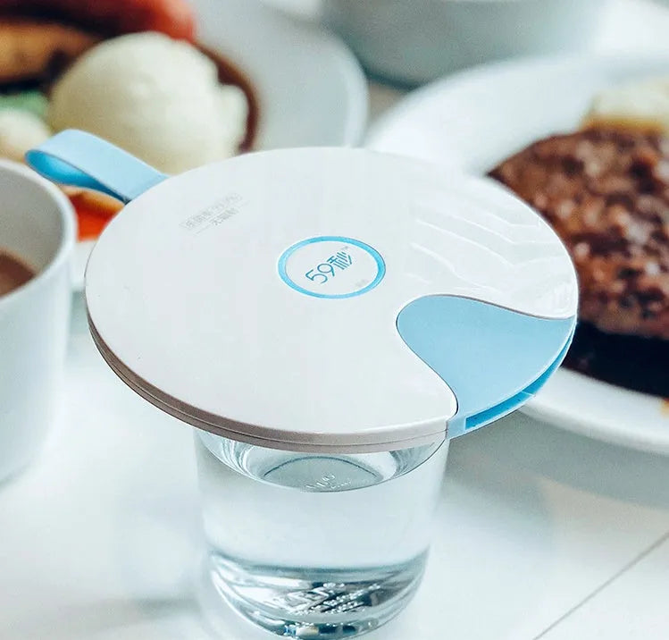 Blue portable baby bottle steriliser with USB cable, showing compact slim design.