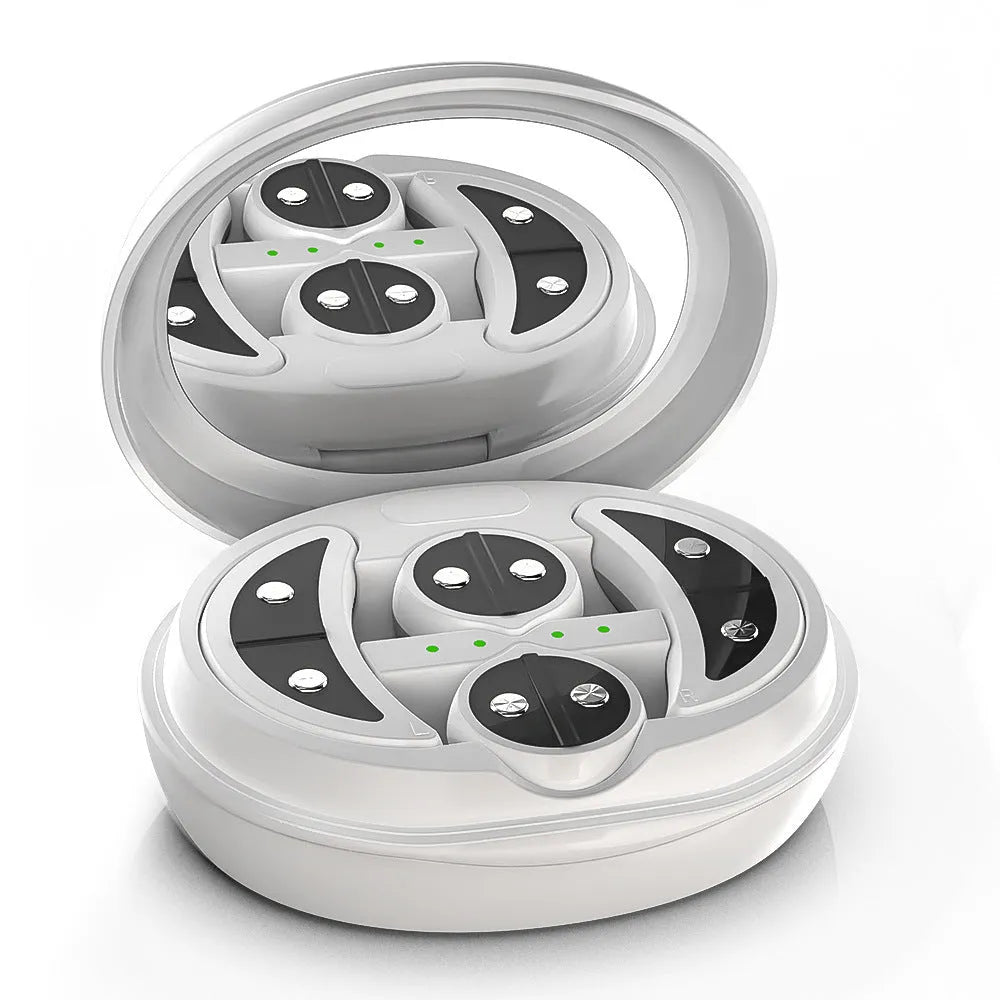 White wireless red light EMS eye and face two-in-one massage device on a table.