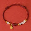 Adjustable 925 silver women's bracelet with Hetian jade bead and cinnabar red rope in shore colour