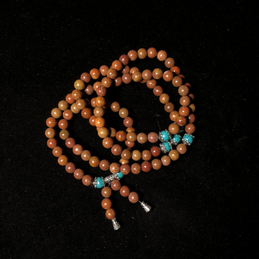 108-bead Lvzhu stone bracelet with geometric shaping and 5-6mm diameter beads on wrist