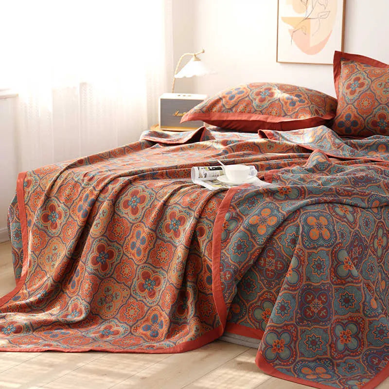 Cotton gauze bed blanket three-piece set with plants and flowers pattern showing blanket and matching pillowcases