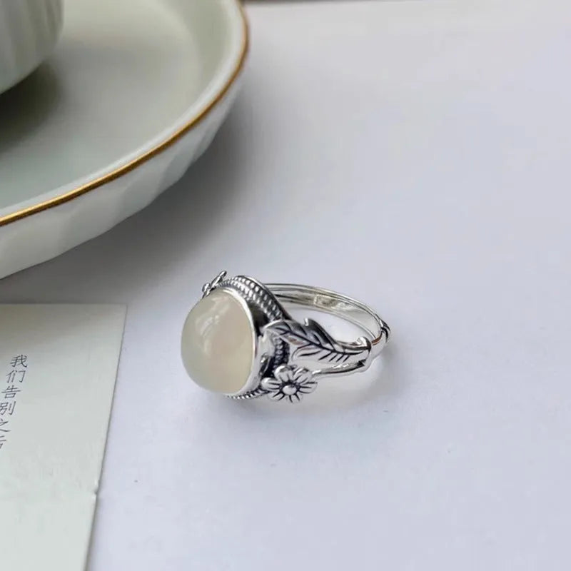 Copper vintage ring with adjustable opening and imitation white chalcedony stone
