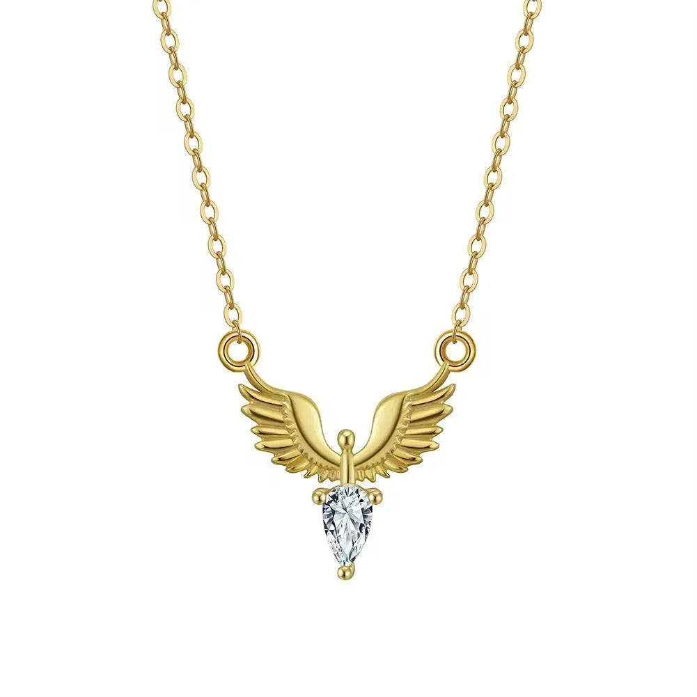 Women's eagle pendant silver necklace with O-ring chain on a grey background.