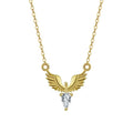 Women's eagle pendant silver necklace with O-ring chain on a grey background.