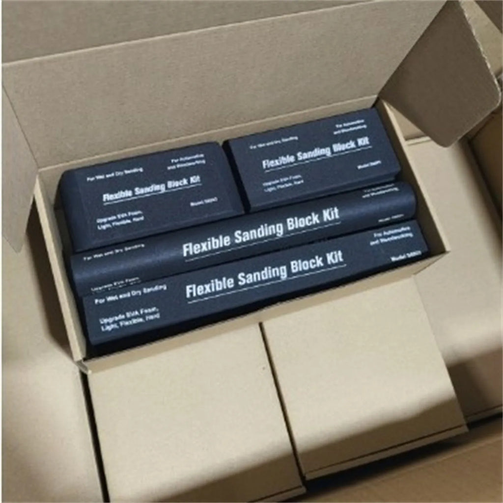 Set of seven black frosted EVA foam blocks inside a metal storage case.