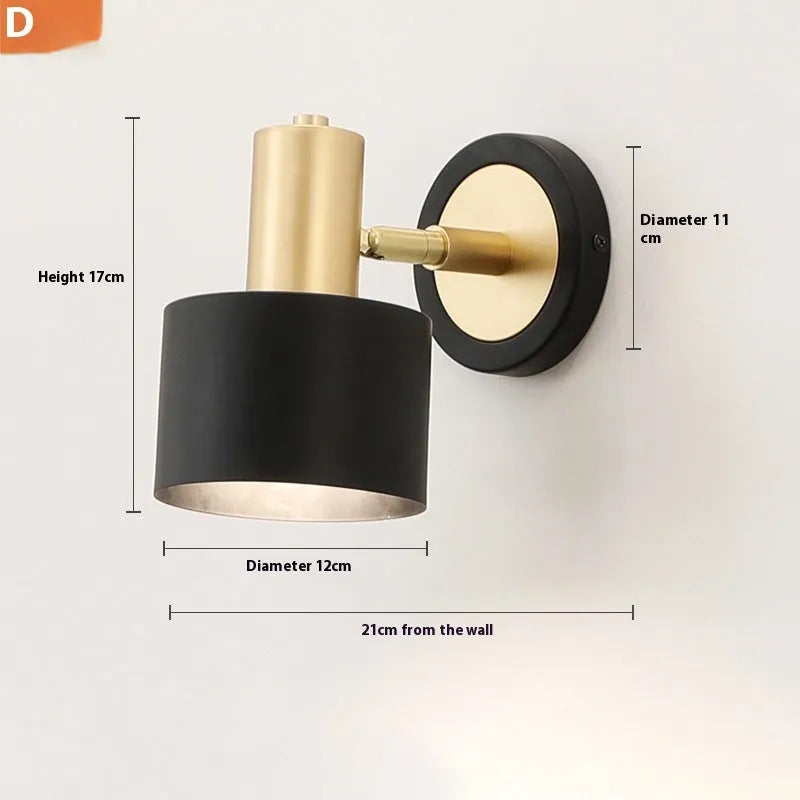 Nordic style iron wall lamp mounted beside a bed, showcasing its metal construction and adjustable light settings.