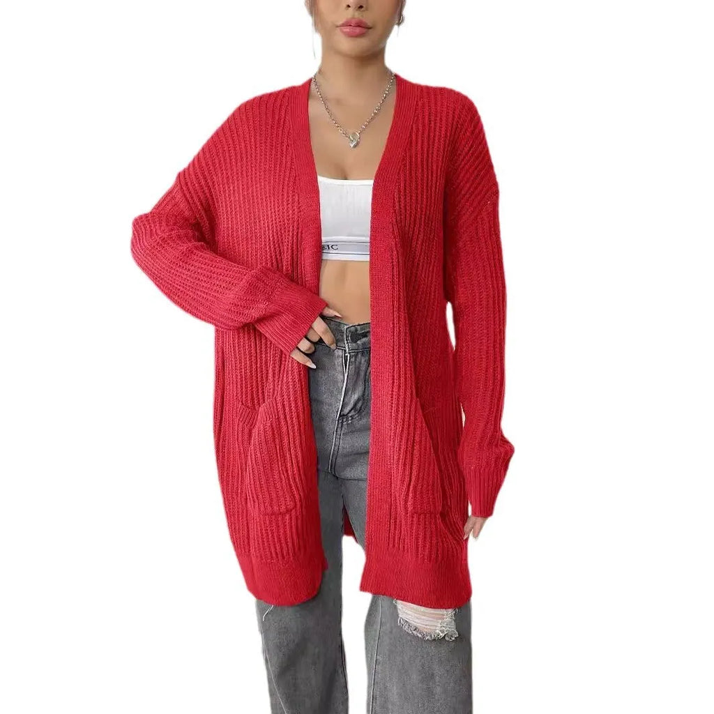 Womens double pocket acrylic cardigan in dark green colour showing mid-length design and loose fit