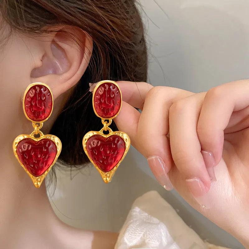 Alloy pleated oval love heart stud earrings with silver needle detailing in multiple colour options