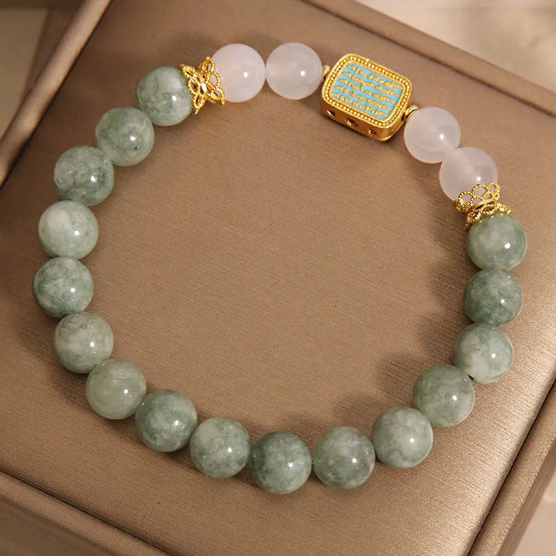 Women's crystal bracelet with oil green emerald stones and a scripture charm