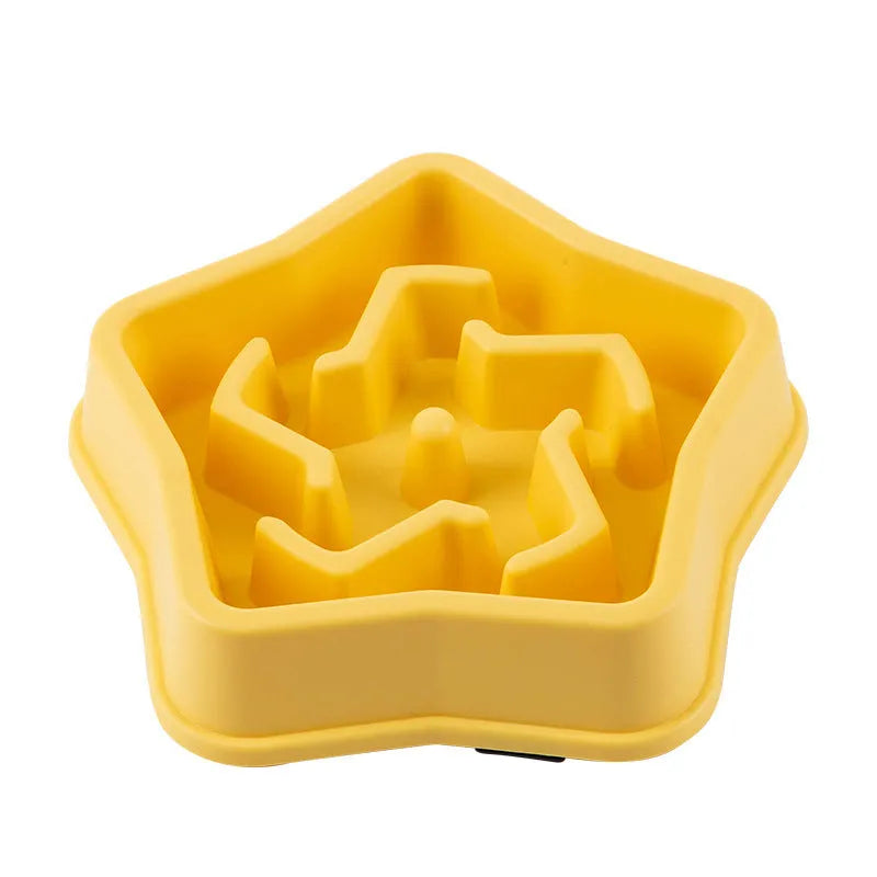Yellow plastic dog slow feeding bowl with textured bottom for choking prevention