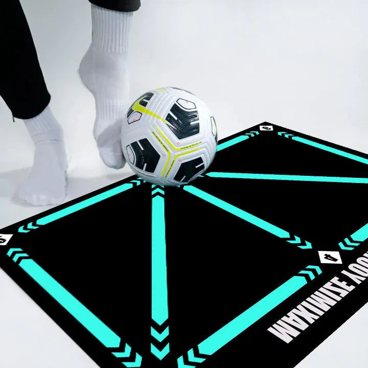 Black football training mat on a flat surface, dimensions 60cm by 90cm.