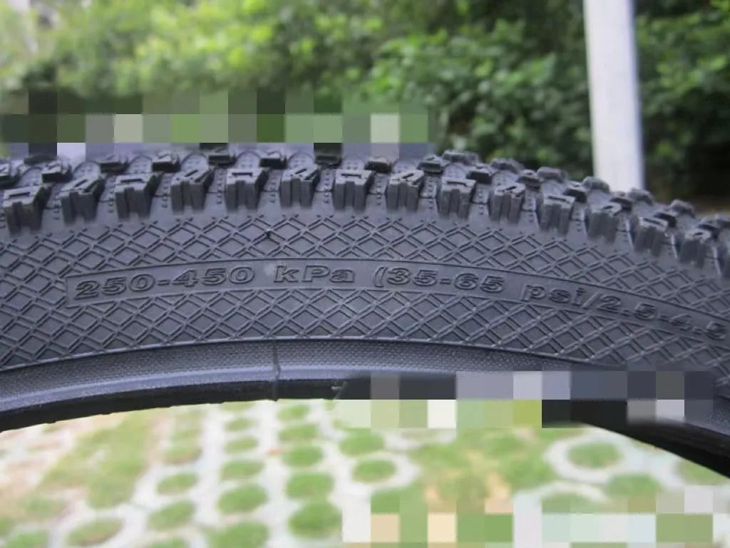 Ultralight mountain bike tyre with black tread, shown in 26, 27.5 and 29 inch sizes