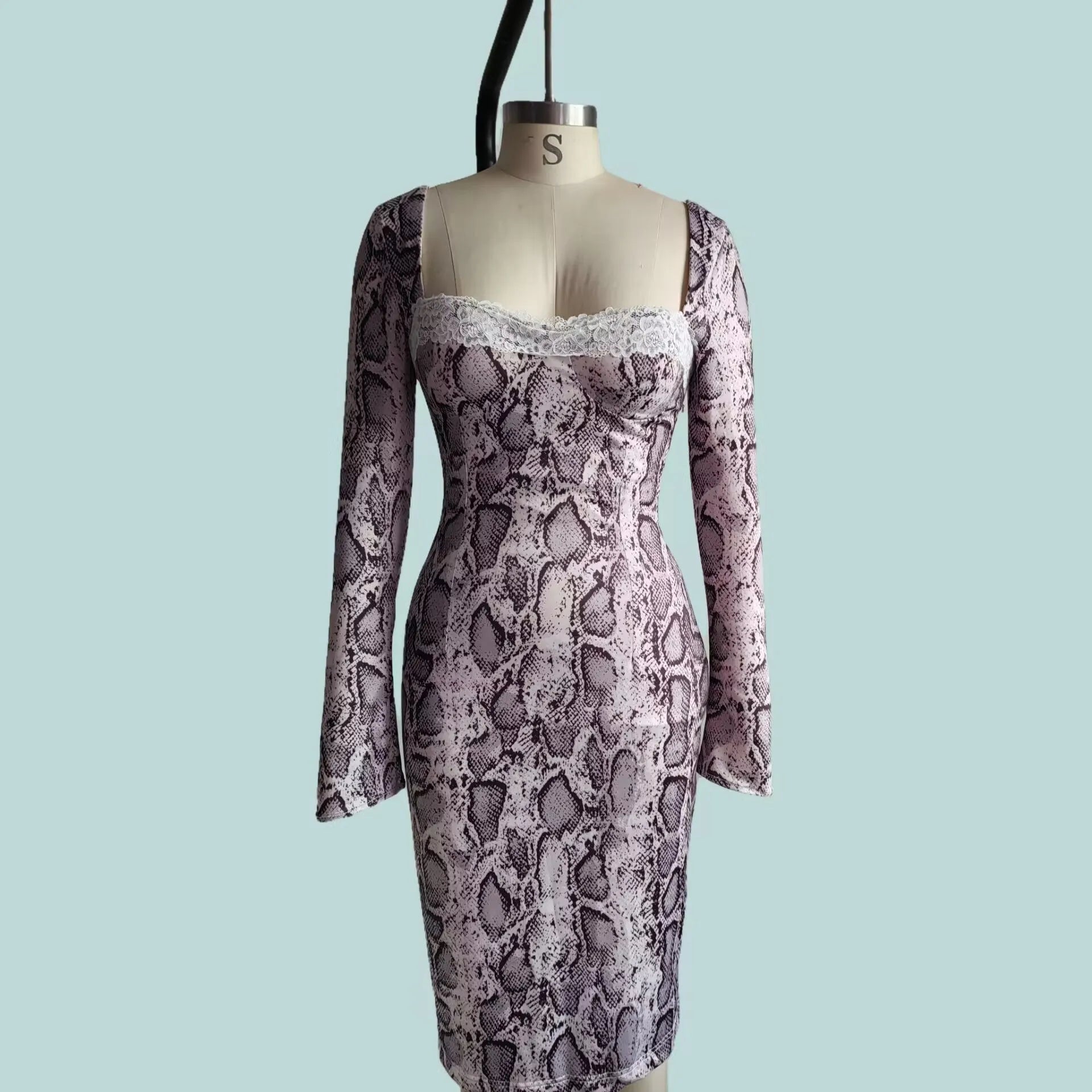 Grey long sleeve digital printed lace dress with 3D pattern and A-line skirt on a mannequin.