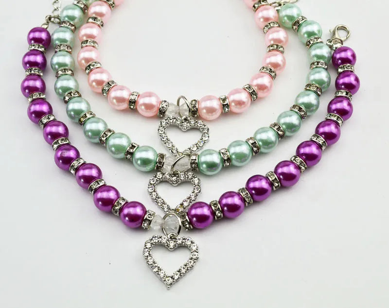 Pet pearl necklace with 10mm imitation pearls, 7mm rhinestone beads, alloy pendant, and white plated K detail