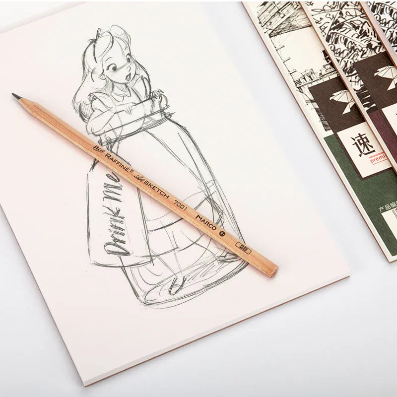 A4 sketchbook with coil binding lying flat open, showing blank heavyweight drawing paper.